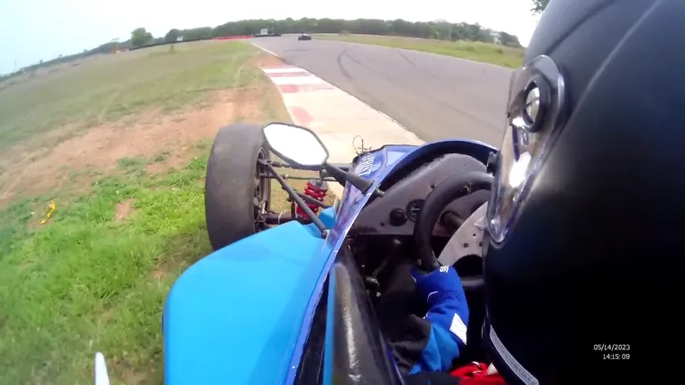 The car returning to pavement at 11 minutes 33 seconds
