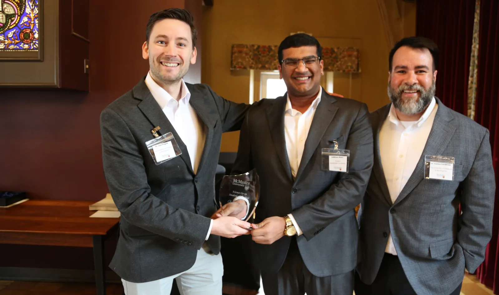 Udbhav Ram receiving the McMaster Science Co-op Student of the Year award
