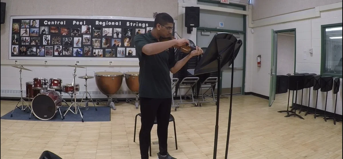 Violin practice in a music classroom